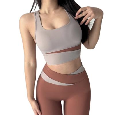 China Who respects the environment. Lady Gym Underwear Skin-Friendly Breathable Custom Moisture Sweat Gathering Shockproof Cross Stitching Fitness Vest Women Yoga Running Bra for sale