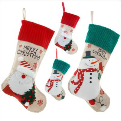 China 2021 Handsome 3D Green Fleece Christmas Elf Luxury Stocking With Legs Gift Bag Christmas Tree Decorations Wholesale Sock for sale