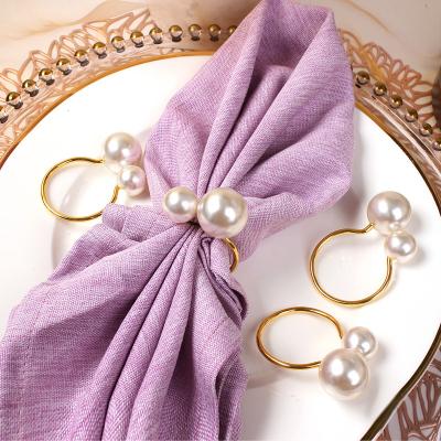 China Luxury Napkin Ring Wedding Party Gatherings Morden Napkin Holder Pearl Table Supplies Banquet Dinner Napkin Home Decor for sale