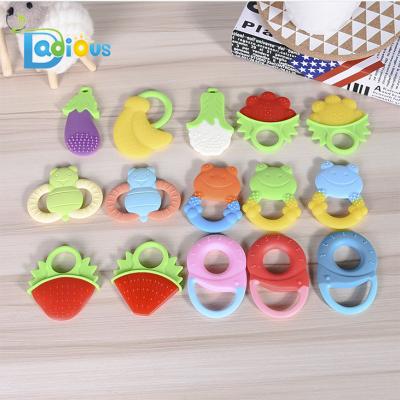 China Baby Toys Silicone Teether BPA Free Silicone Fruit Teether Baby Teether With Blister Card for sale