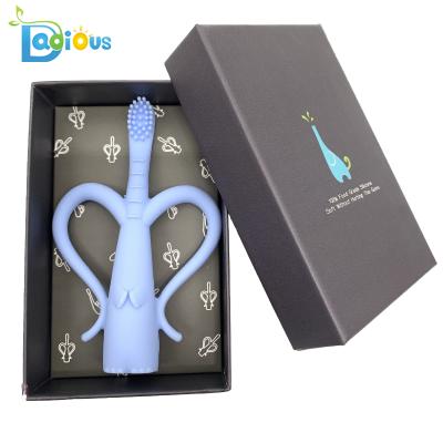 China Wholesale Soft Baby's First Toothbrush Teether Self Silicone Toddler Infant Infant Toothbrush for sale