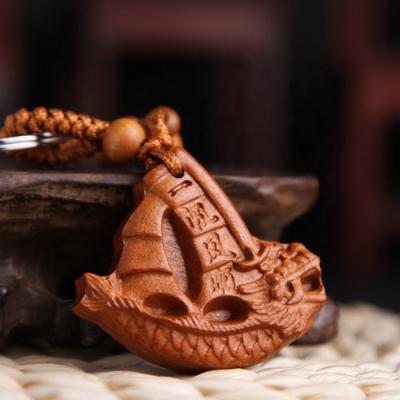 China Portable Abacus Promotion Fishing Wood Wooden Pendant Carving Crafts Men's and Women's Car Wood Carving Key Chain for sale