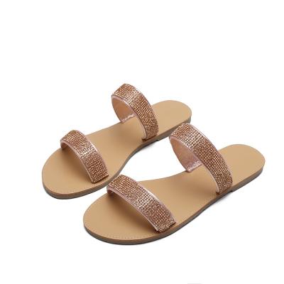 China Fashion durable sandals female Roman style shining bright diamond word sandals European and American flat slippers for sale