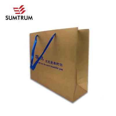 China Recyclable Custom Kraft Paper Handle Logo Brand Brown Shopping Packaging Paper Bag for sale