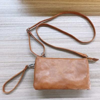 China Fashion Portable Triple Layered PU Strap Clutch Card Holder Cross - Body Saddle Bags for sale