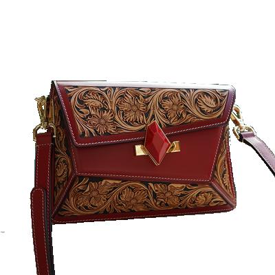 China 2021 New Arrival Genuine Leather Handmade Carved Strap Removable Cross - Body Clutch Bag for sale