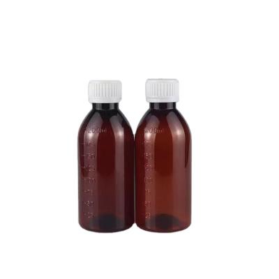 China Wholesale High Quality Oral Liquid Medicine Bottles Pet Syrup Plastic Bottle With Scale With Measuring Lid for sale