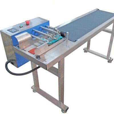 China Beverage Friction Type Automatic Conveyor Feeder Paging Machine For Plastic Bags Label Box 1.5*0.3*0.75M for sale