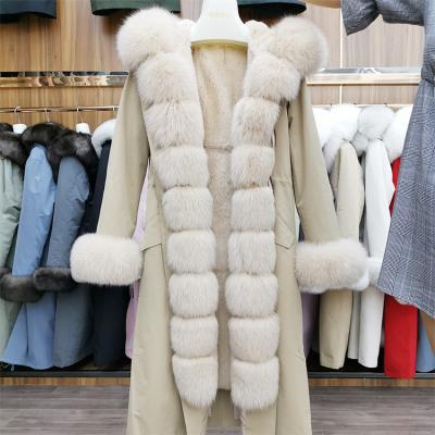 China Green pink parka camouflage collar fur coat fox factory ladies fluffy fur coat wholesale direct anti-shrink fur for sale