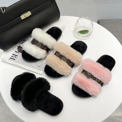 China Factory direct 2021 fashion trend wholesale furry soft faux fur slips winter slipper for woman own customers soft faux fur logo slippers for sale