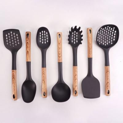 China Sustainable Chinese Popular 7 Piece Kitchen Utensil Set Cooking Tool Kit Food Grade Nylon Stainless Steel Ring Kitchenware for sale