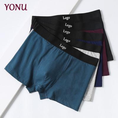 China Mid Waist U Shape Lingerie Cotton Quick Dry Men's Breathable Boxer Wholesale Seamless Sexy Design Briefs Shorts for sale