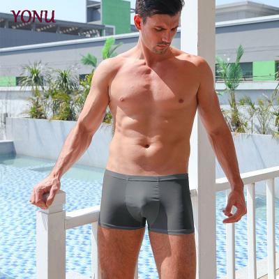 China Manufacturers Breathable Ice Silk Comfortable Underwear Panties Mid Waist Solid Color Quick Dry Men's Breathable Boxer Briefs for sale