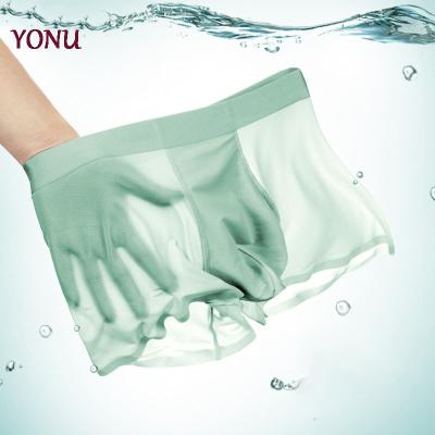 China High Quality Ice Silk Transparent Underwear Large Size Seamless Breathable Men's Boxer Briefs Shorts for sale