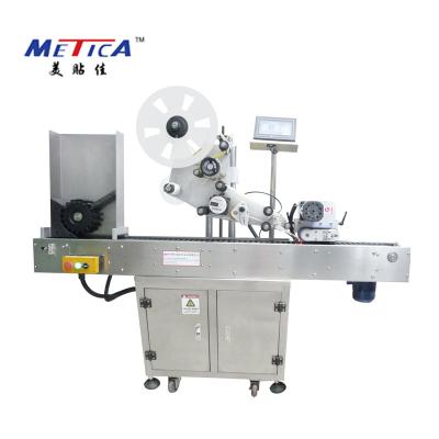 China Automatic horizontal food sticker label applicator machine and ball pen, glue tube, plastic tube labeling machine for round vial for sale