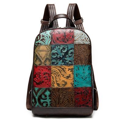 China Waterproof 2023 retro handmade leather large capacity women's backpack, ethnic style stitching features, each bag is unique for sale