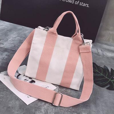 China Solid Color Canvas Tote Bag Creative Wholesale Bunch Mouth Blank Drawstring Bag Student Cotton Portable Shopping Handled Bag for sale