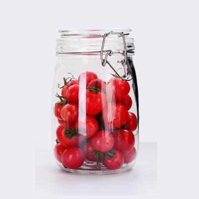 China Sustainable Kitchen Utensils Wholesales 750ml Glass Jar With Metal Clip Cylinder Glass Jar for sale