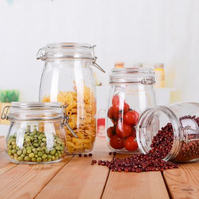 China Wholesale 2200ml Sustainable Kitchen Utensils Cylinder Glass Jar With Metal Clip Sealing Glass Jar for sale