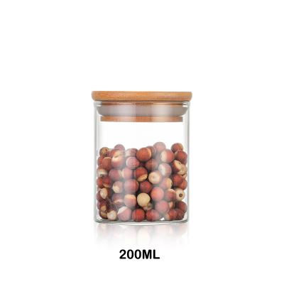 China Freshness Preservation Storage Bottles And Jars Airtight Food Storage Container Glass Jar With Bamboo Lid for sale