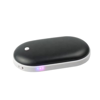 China Fast Portable Rechargeable Hand Warmer Support Charging Gifts Promotional Items for Business and Reusable Pebble Hand Warmer Power Bank 5200mah for sale