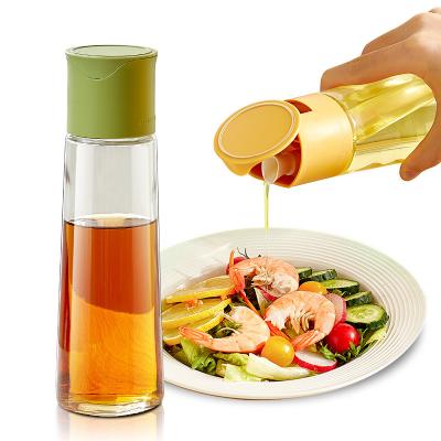 China Dispensador de aceite de vidrio de cocina de 500 ml Botella Contenedor de aceite de cocina multiuso en venta