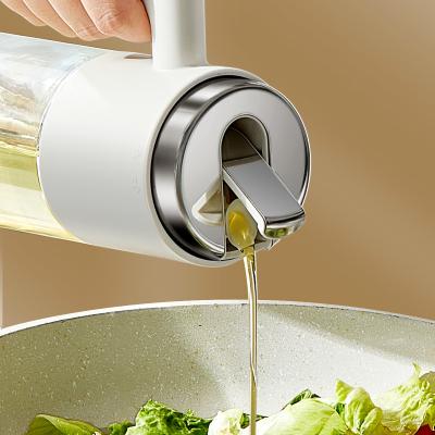 China 500 Ml 17oz Glass Olive Oil Dispenser Bottle Oil Pot with Handle Auto Flip Leakproof Condiment Container with Stainless Steel lid for sale