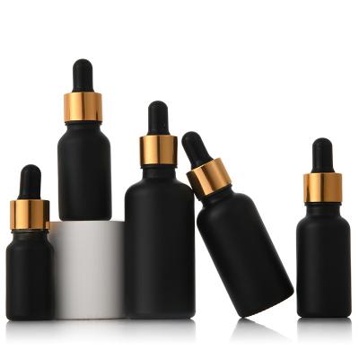 China 2021 Modern Fashionable Matte Black 10ml Bottle With Essential Oil Small Glass Dropper Bottles For Essential Oils 40ml for sale