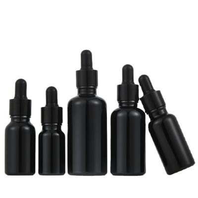 China 2021 Personal Care Essential Oil Bottle Black Mate Dropper Glass Bottle Essential Oil for sale