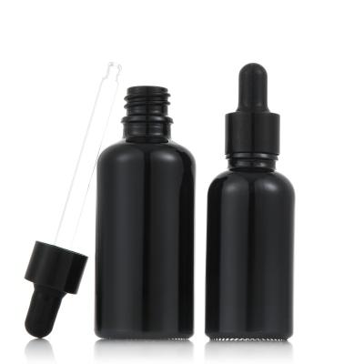 China Personal Care Essential Oil Bottle Black Mate Dropper Glass Bottle Essential Oil for sale