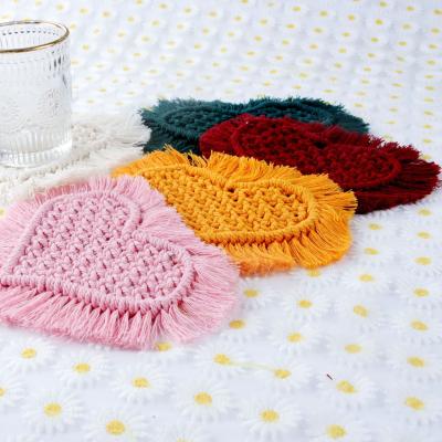 China Sustainable Color Of Macaroon Cotton Cord Boho Spiral Two Heart Toned Macrame Coasters With Tassels for sale