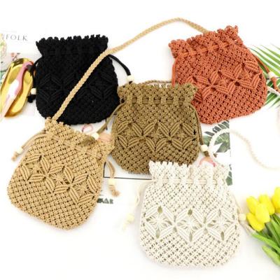 China Small Straw Bucket Bohemian Bag With Beads Retro Woven Shoulder Boho Hollow Bag For Girls for sale