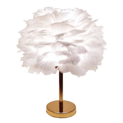 China Feather Oxidation Anti-scratch Modern Creative Lamp Decorative Lamp Wedding Warm And Romantic Outdoor And Simple Bedside Bedroom Table Lamp for sale