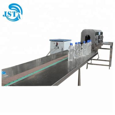 China Manual PVC Beverage Sleeve Shrink Labeling System For Bottle for sale