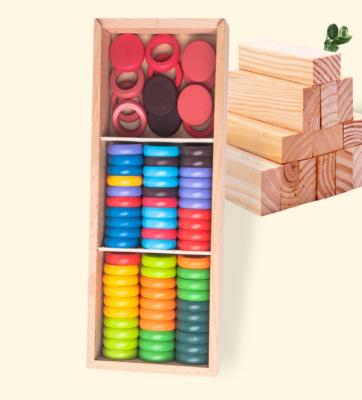 China Wood 12 Colors Wooden Stacking Coins And Rings Rainbow Early Learning Set Toy Building Blocks for sale