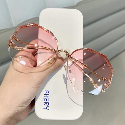 China Rimless Sunglasses Shape Rimless Women Sunglasses Vintage Circle Metal Frame Sun Glasses Cut Edges Acuvue Shade Frameless Uv400 Glasses for sale