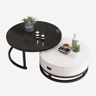 China Classic black and white extendable tempered glass top coffee table round modern design for sale