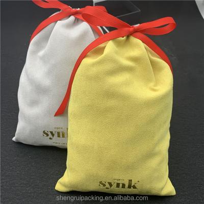 China Custom Soft Drawstring Faux Suede Cosmetic Bag With Gold Foil Suede Drawstring Makeup Bag for sale