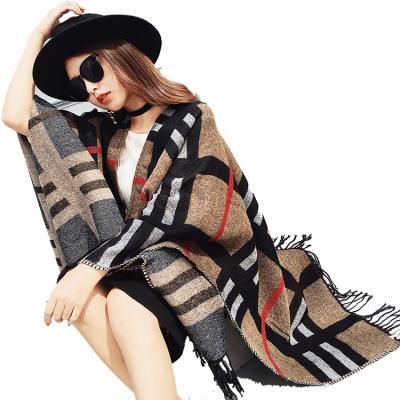 China Latest Tassel Design High Quality Women Acrylic Knit Lattice Pattern Winter Cape Shawl Poncho For Women for sale