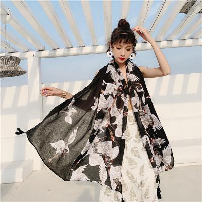 China Retro Holiday Decoration Art Totem Cotton And Linen Sun Protective Shawl Thin Black Beach Scarf for sale