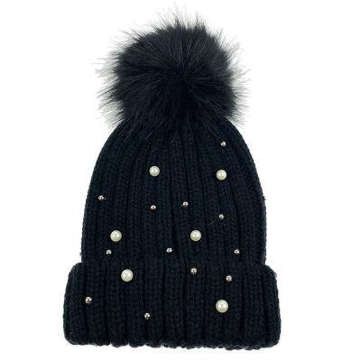 China Fashion Brand JOINT Black Striped Knitted Beanie Hat With Big Fur Pompom For Women for sale