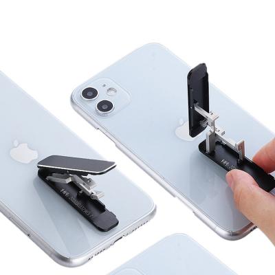 China 2021 Newest Adjustable Aluminum Alloy Adjustable Stick On Back Hidden Mini Foldable Mobile Phone Stand Slim Holder for sale