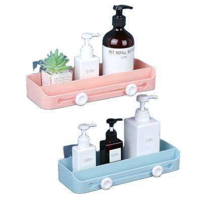 China Wall Mounted Creative Free Seamless Storage Rack Plastic Hole Fashion Bath Bottle Holder for sale