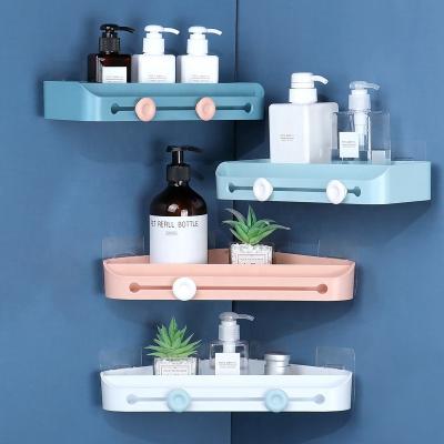 China Widely Use Fashion Creative Wall Mounted Triangle Storage Rack Bathroom Kitchen Toilet Corner Storage Plastic Shelf for sale