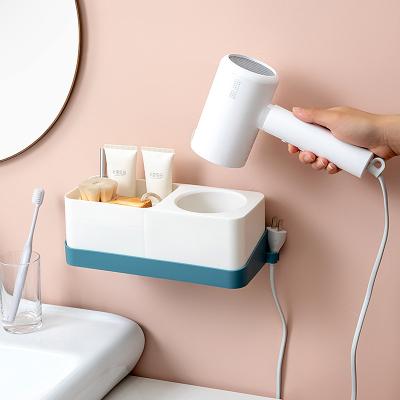 China No Punch Eco-Friendly No Drilling Bathroom Storage Shelf Hair Styling Tools Organizer Rack Plastic Hair Dryer Holder for sale