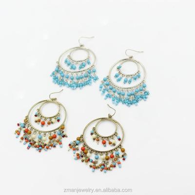 China 2022 Wholesale Environmentally Friendly Circle Round Rice Beaded Indian Jewelry Drop Earrings Statement Earrings Pearl Tassels Earrings for sale