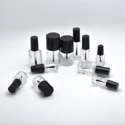 China Unique Empty Round Cosmetic Free Sample Customized UV Gel Nail Polish Bottles With Caps And Brushes for sale