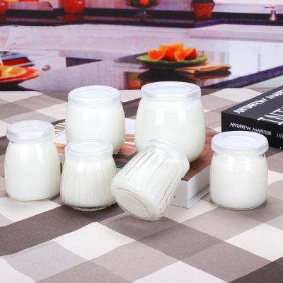 China Wholesale 100ml 200ml Food Wide Clear Mouth Glass Bottle Yogurt Pudding Candy Jar With Plastic Lid for sale