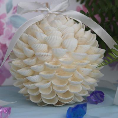 China Natural Beach Wedding Decor Handmade Coastal Shell&Conch Ball Cockle Shell Wedding Flower Home Decor for sale