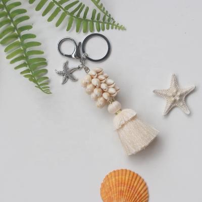 China Home Decoration Metal Cowrie Shell Key Chain Natural Shell &Conch Shell Crafts and Gifts Tourism Souvenirs for sale